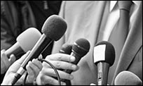 A public health official speaking with reporters.