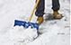 a person shoveling snow