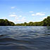 Photo of a lake surrounded by mountains.