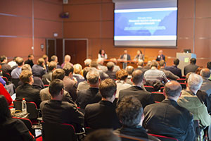 a group of people at a public meeting