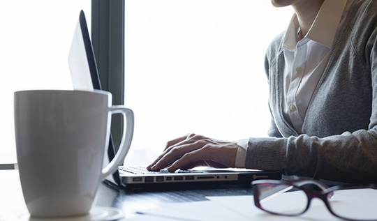 businesswoman using laptop