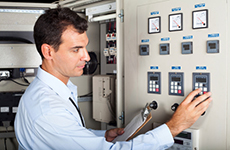 	man at control panel