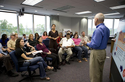 man teaching group