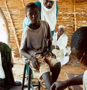 Boy getting foot treatment