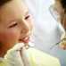 a girl getting a dental exam