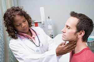 Doctor Inspecting Patient