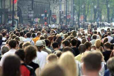 People walking on a busy city street.