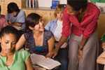 Teacher talking with her student