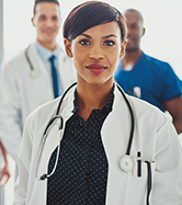 Three doctors female doctor in foreground