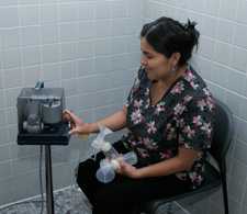 woman using a breast pump