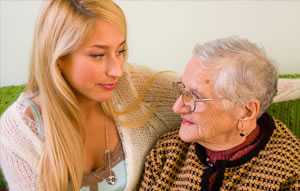 Photo of a young woman and her elderly mother