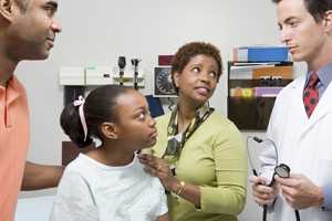 Photo of a family in a doctor's office