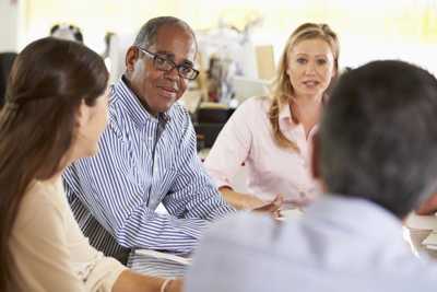 Photo of a group of people working together