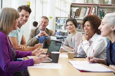 Photo of a group of people talking