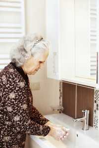 Photo of a woman washing her hands