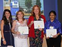 	Ambassadors posing with their certificates of completion