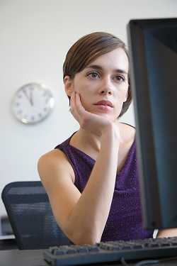 Woman at computer.