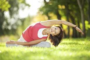 A woman stretching.