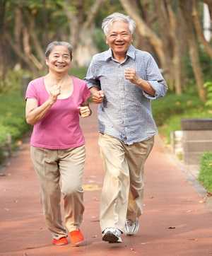 senior couple jogging