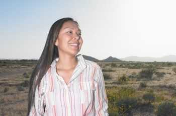 woman standing in desert