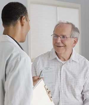 doctor talking with patient