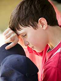 Boy holding cap and wiping brow - Temperature