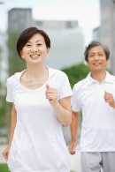 Older couple walking briskly