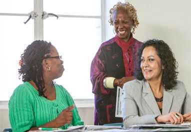 	Two program participants talking with their lifestyle coach