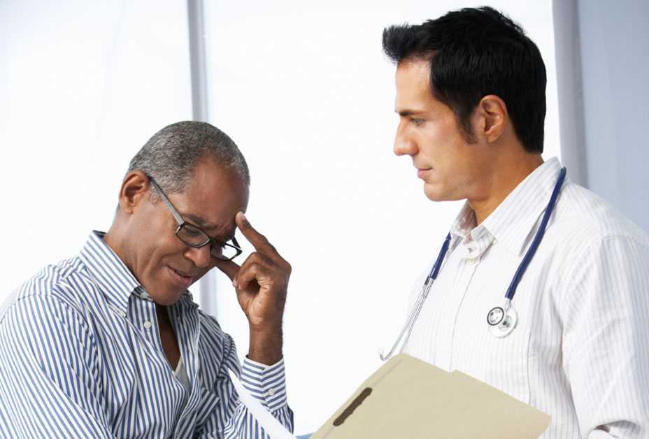 Doctor consulting with patient