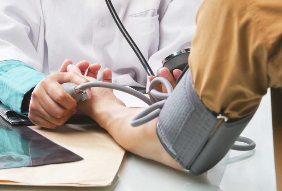 Man having blood pressure checked