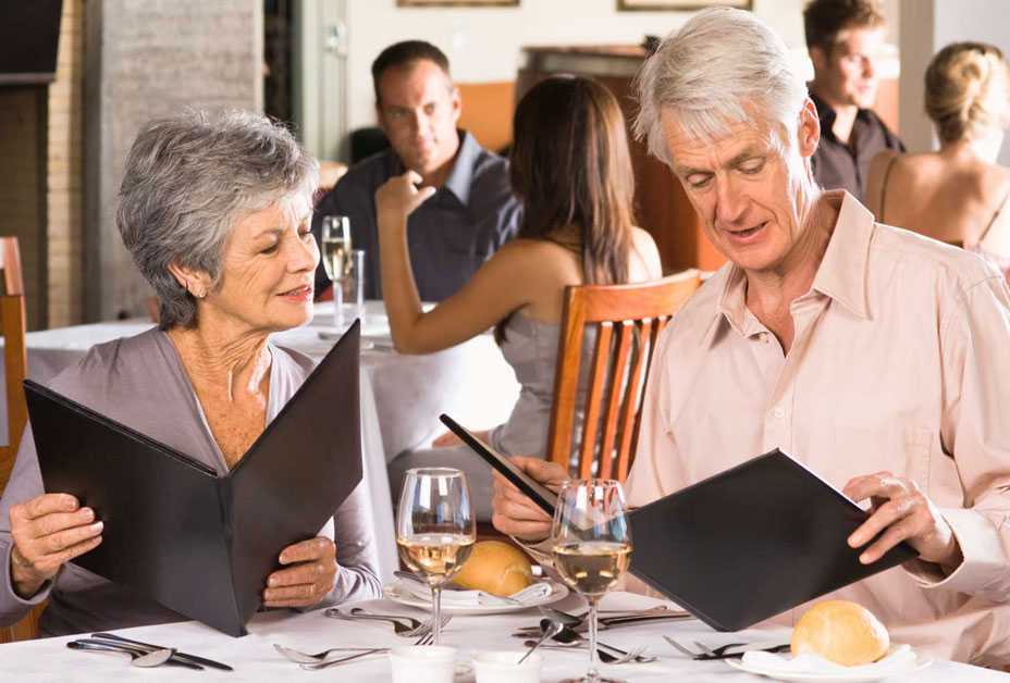 Couple looking at menu