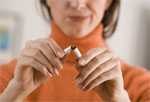 Woman breaking cigarette in two