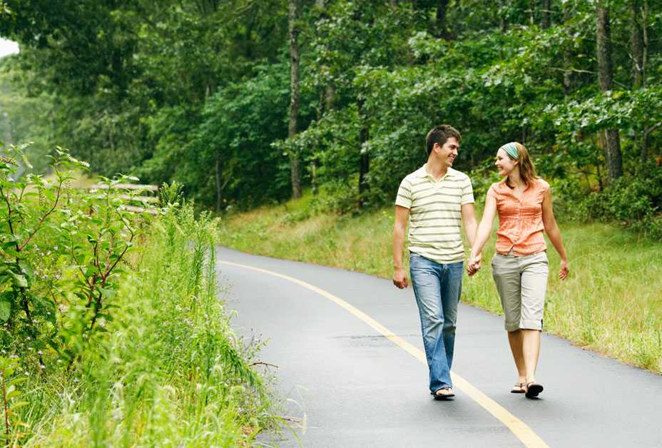 Couple walking in the woods