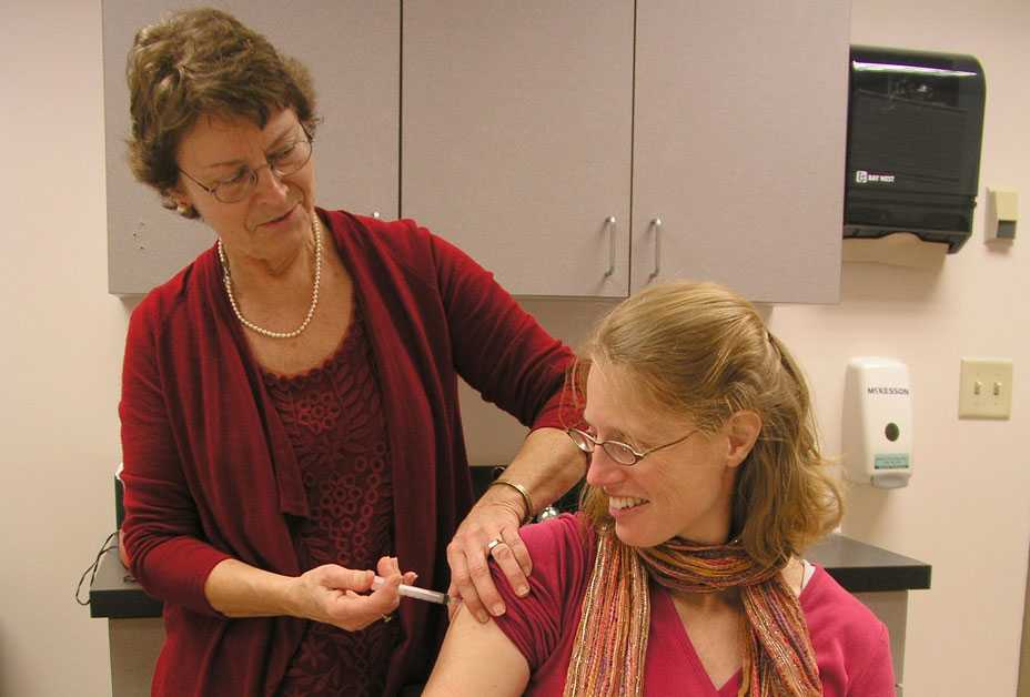 Woman getting vaccination