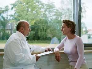 Doctor talking with a patient