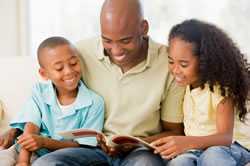 man reading to children