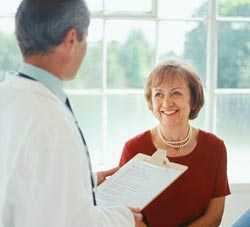 Doctor with female patient