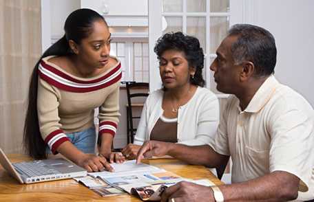 Adult woman discussing things with parents