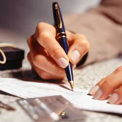 Woman writing with pen