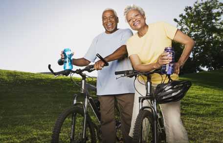 Senior couple riding bicycles