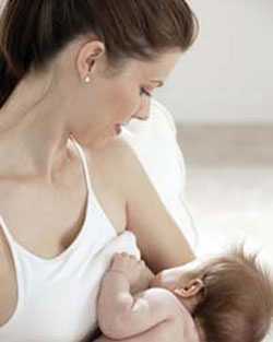 Mother breastfeeding baby