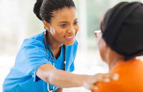 Doctor comforting patient