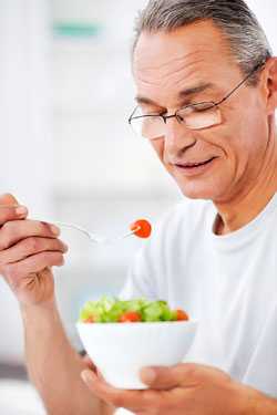 Man eating salad