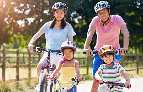 Family riding bicycles