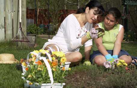 Mother and daughter gardening