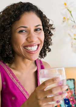 Woman drinking glass of water