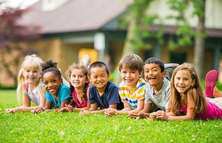 Group of children sitting on floor