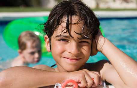 Boy in swimming pool