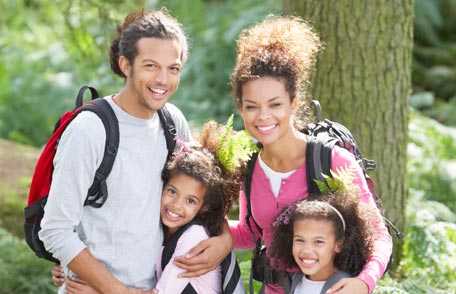 Family of four outdoors