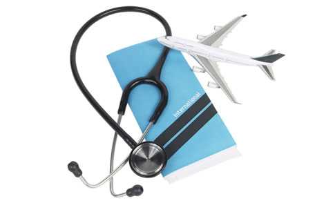 Passport, stethoscope and toy plane